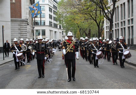 CITY OF LONDON, ENGLAND - NOVEMBER 12: Military marching band on parade at the Lord Mayor's Show in the City of London on November 12, 2010. The Lord Mayor's Show is an annual event in London.