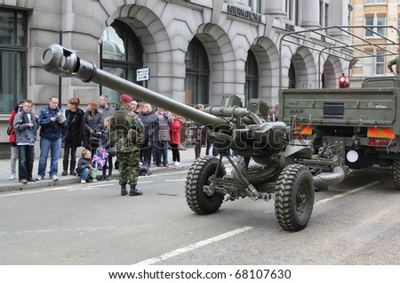 CITY OF LONDON, ENGLAND - NOVEMBER 12: Army field artillery gun on parade in the Lord Mayor\'s Show in the City of London on November 12, 2010. The Lord Mayor\'s Show is a yearly parade through London.
