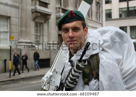 CITY OF LONDON, ENGLAND - NOVEMBER 12: An unidentified soldier in white snow camouflage at the Lord Mayor's Show in the City of London on November 12, 2010. The Lord Mayor's Show is an 800 year old yearly parade.