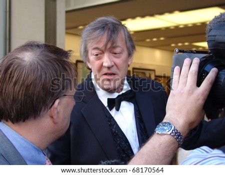REGENT STREET, LONDON - MAY 11: Stephen Fry the actor and TV presenter being interviewed at a product launch in Regent Street, London on May 11, 2010. Stephen Fry is a famous TV presenter and actor.