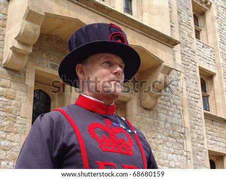 TOWER OF LONDON, UK - AUGUST 24: A yeoman of the guard at the Tower of London in London, England on August 24, 2010. The Beefeaters, Yeoman of the Guard, protect the crown jewels of England.