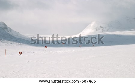 Cross country ski hiking trail with red crosses, Lapland north Sweden