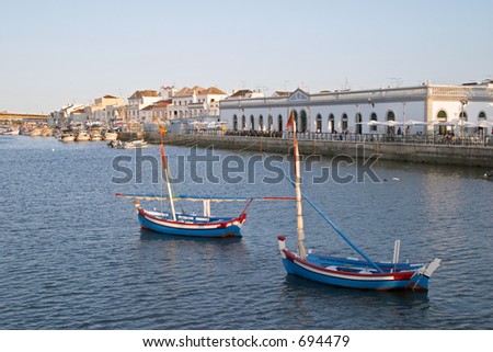Boats in the sea channel of Tavira, Algarve, Portugal