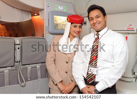 HONG KONG, CHINA - MAY 8, 2012: Emirates crew members in Airbus A380 aircraft after landing MAY 8, 2012 in Hong Kong.  Emirates is the largest airline in the Middle East