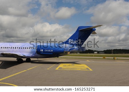 HELSINKI, FINLAND - JUNE 14, 2011:  Blue1 flight at Helsinki Airport on June 14, 2011. Blue1 flies to around 28 destinations in Finland, Scandinavia and the rest of Europe
