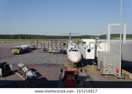 HELSINKI, FINLAND - JUNE 07, 2011: Scandinavian Airlines flight at Helsinki Airport on June 07, 2011 in Helsinki, Finland. The SAS is the ninth-largest airline in Europe