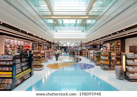 DUBAI, UAE - MARCH 31: duty free zone in airport on March 31, 2014 in Dubai. Dubai International Airport is a major airline hub in the Middle East, and is the main airport of Dubai.