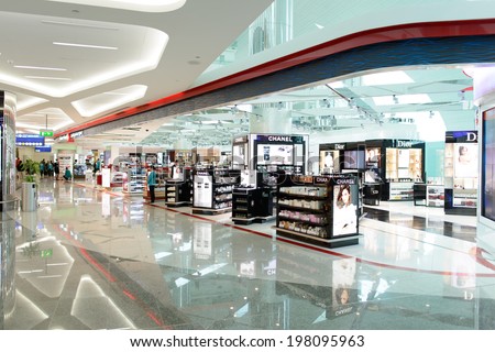 DUBAI UAE MARCH 31 airport interior on March 31 2014 in Dubai Dubai International Airport is a major airline hub in the Middle East and is the main airport of Dubai DUBAI UAE MARCH 31 airport interior on March 31 2014 in Dubai Dubai International Airport is a major airline hub in the Middle East and is the main airport of Dubai