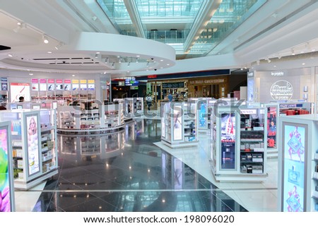 DUBAI, UAE - MARCH 31: duty free zone in airport on March 31, 2014 in Dubai. Dubai International Airport is a major airline hub in the Middle East, and is the main airport of Dubai.