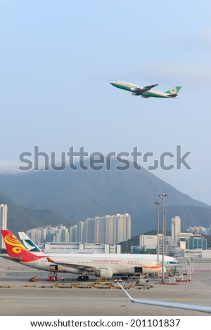 HONG KONG - APRIL 17: EVA Air jet flight take-off from airport on April 17, 2014 in Hong Kong. Hong Kong International Airport is the one of the best airport in the annual passenger survey by Skytrax.