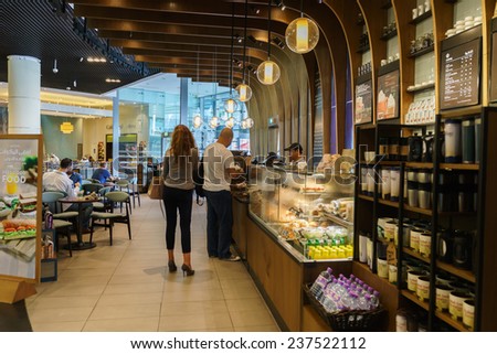 DUBAI - OCTOBER 15: Starbucks Cafe interior in the Dubai Mall on October 15, 2014 in Dubai, UAE. Starbucks is the largest coffeehouse company in the world, with more then 23000 stores