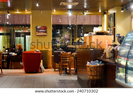 GENEVA - SEP 15: Starbucks cafe interior on September 15, 2014 in Geneva, Switzerland. Starbucks is the largest coffeehouse company in the world, with more then 23000 stores