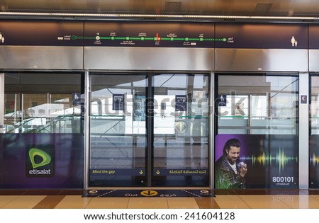 DUBAI - OCT 15: Dubai subway interior on October 15, 2014. The Dubai Metro is a driverless, fully automated metro rail network in the United Arab Emirates city of Dubai