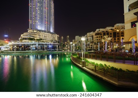 DUBAI - OCT 15: area near the Dubai Fountain on October 15, 2014 in Dubai, UAE. The Dubai Fountain is the world\'s largest choreographed fountain system set on the 30-acre manmade Burj Khalifa Lake