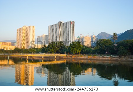 HONG KONG - OCT 18: Sha Tin district on evening on October 18, 2014 in Hong Kong, China. Shing Mun River and Sha Tin district located in the New Territories, Hong Kong