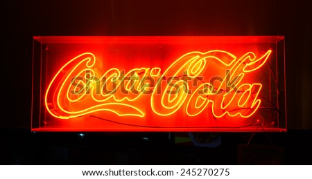 BANGKOK, THAILAND - NOV 11: Coca Cola red sign on November 11, 2014. Coca-Cola is a carbonated soft drink sold in stores, restaurants, and vending machines throughout the world