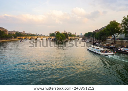 PARIS - SEP 06: Seine river in the evening on September 06, 2014 in Paris, France. Paris, aka City of Love, is a popular travel destination and a major city in Europe