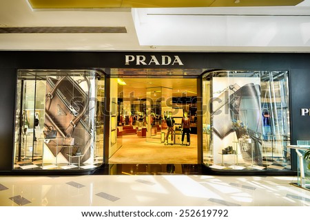 SHENZHEN, CHINA - FEBRUARY 04, 2015: Prada boutique. Prada is an Italian luxury fashion house, specializing in ready-to-wear leather and fashion accessories, shoes, luggage, perfumes, watches, etc.,