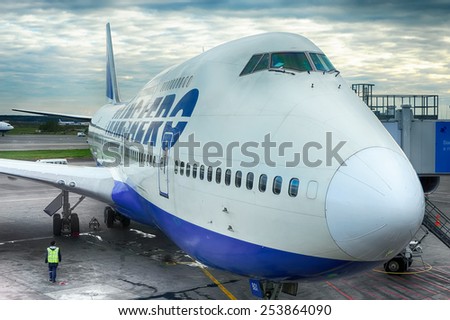 MOSCOW, RUSSIA - OCTOBER 02, 2010: Docked boeing-747 in Domodedovo airport. The Boeing 747 is a wide-body commercial airliner and cargo transport aircraft