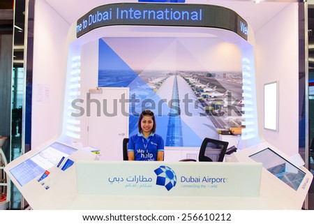 DUBAI, UAE - APRIL 18, 2014: airport help desk. Dubai International Airport is an international airport serving Dubai. It is a major airline hub in the Middle East, and is the main airport of Dubai.