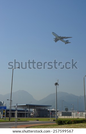 HONG KONG - OCTOBER 06, 2013: Cathay Pacific jet aircraft take-off from Hong Kong International Airport, the world\'s busiest cargo gateway and one of the world\'s busiest passenger airports
