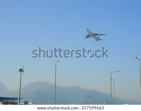 HONG KONG - OCTOBER 06, 2013: Cathay Pacific jet aircraft take-off from Hong Kong International Airport, the world\'s busiest cargo gateway and one of the world\'s busiest passenger airports