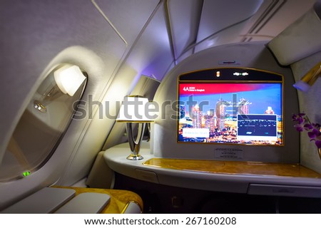 DUBAI, UAE - MARCH 31, 2015: Emirates first class interior. Emirates is one of two flag carriers of the United Arab Emirates along with Etihad Airways and is based in Dubai.