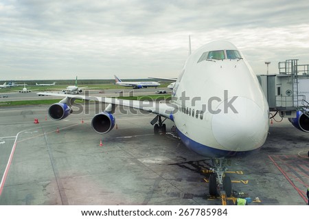 MOSCOW, RUSSIA - OCTOBER 02, 2010: Docked boeing-747 in Domodedovo airport. The Boeing 747 is a wide-body commercial airliner and cargo transport aircraft