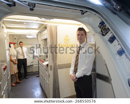 BANGKOK, THAILAND - MARCH 31, 2015: Emirates A380 crew member meet passengers. Emirates is one of two flag carriers of the United Arab Emirates along with Etihad Airways and is based in Dubai.