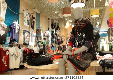 HONG KONG - APRIL 14, 2015: New Town Plaza interior. New Town Plaza is a shopping mall in the town centre of Sha Tin in Hong Kong. Developed by Sun Hung Kai Properties.
