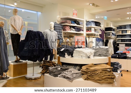 HONG KONG - APRIL 14, 2015: New Town Plaza interior. New Town Plaza is a shopping mall in the town centre of Sha Tin in Hong Kong. Developed by Sun Hung Kai Properties.