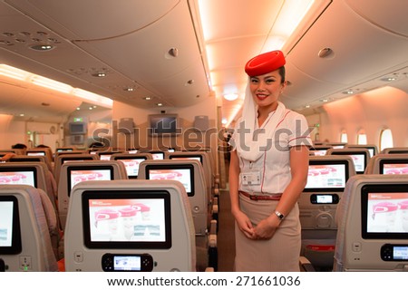 HONG KONG - MARCH 10, 2015: Emirates Airbus A380 crew member. Emirates handles major part of passenger traffic and aircraft movements at the airport.