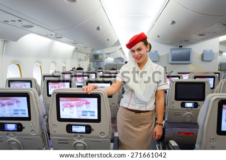 HONG KONG - MARCH 10, 2015: Emirates Airbus A380 crew member. Emirates handles major part of passenger traffic and aircraft movements at the airport.