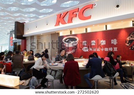 SHENZHEN, CHINA - FEBRUARY 16, 2015: KFC restaurant interior. KFC is a fast food restaurant chain that specializes in fried chicken and is headquartered in Louisville, Kentucky, in the United States