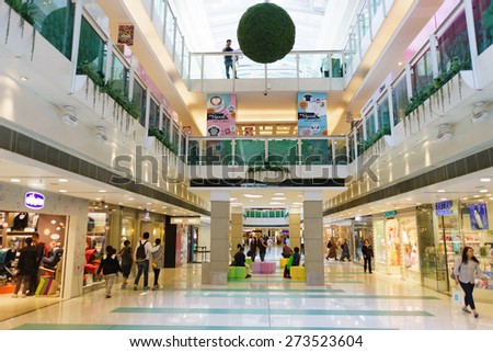 HONG KONG - APRIL 03, 2015: New Town Plaza interior. New Town Plaza is a shopping mall in the town centre of Sha Tin in Hong Kong. Developed by Sun Hung Kai Properties.