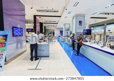 DUBAI - OCT 15: gadgets and electronics devices shop in the Dubai Mall on October 15, 2014 in Dubai, UAE. The Dubai Mall located in Dubai, it is part of the 20-billion-dollar Downtown Dubai complex