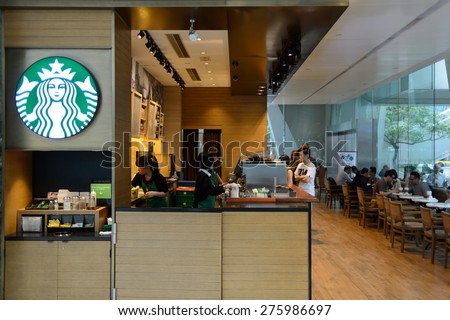 HONG KONG - MAY 05, 2015: Starbucks cafe interior. Starbucks is the largest coffeehouse company in the world, with more then 23000 stores