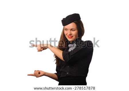 Studio shot of beautiful young flight attendant in black clothing