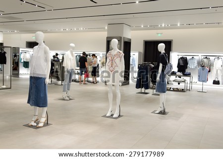 SHENZHEN, CHINA - MAY 17, 2015: shopping center interior. Shenzhen is a one of major city in the south of China, situated immediately north of Hong Kong Special Administrative Region.