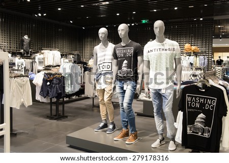 SHENZHEN, CHINA - MAY 17, 2015: shopping center interior. Shenzhen is one of major city in the south of China, situated immediately north of Hong Kong Special Administrative Region.