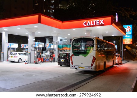 HONG KONG - APRIL 15, 2015: Caltex fuel station at evening. Caltex is a petroleum brand name of Chevron Corporation used in more than 60 countries