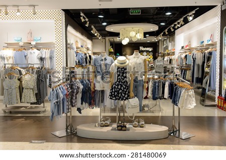 SHENZHEN, CHINA - MAY 25, 2015: COCO Park shopping center interior. Shenzhen is a major city, situated immediately north of Hong Kong Special Administrative Region.