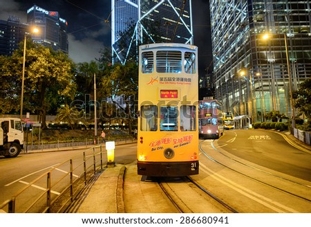 HONG KONG - JUNE 03, 2015: double-decker tram on street of HK. Hong Kong Tramways is a tram system in Hong Kong, being one of the earliest forms of public transport in the metropolis
