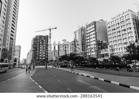 DUBAI - OCT 16: Dubai streets on October 16, 2014. Dubai is the most populous city and emirate in the UAE, and the second largest emirate by territorial size after the capital, Abu Dhabi