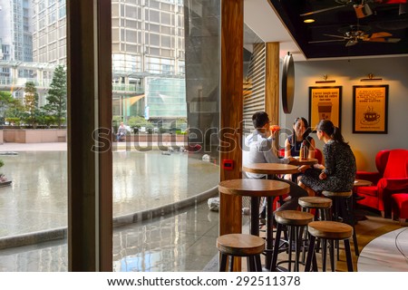 HONG KONG - JUNE 03, 2015: Pacific Coffee cafe interior. Pacific Coffee Company is a Pacific Northwest U.S.- style coffee shop group originating from Hong Kong