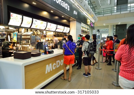 HONG KONG - JUNE 04, 2015: McDonald\'s restaurant interior. McDonald\'s is the world\'s largest chain of hamburger fast food restaurants, founded in the United States.