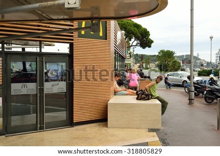 NICE, FRANCE - AUGUST 15, 2015: McDonald\'s restaurant exterior. McDonald\'s is the world\'s largest chain of hamburger fast food restaurants, founded in the United States.
