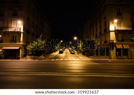 PARIS, FRANCE - AUGUST 11, 2015: Paris streets at night. Paris, aka City of Love, is a popular travel destination and a major city in Europe
