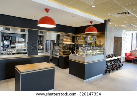 LA VILLE-AUX-DAMES, FRANCE - AUGUST 12, 2015: McDonald\'s restaurant interior. McDonald\'s is the world\'s largest chain of hamburger fast food restaurants, founded in the United States.