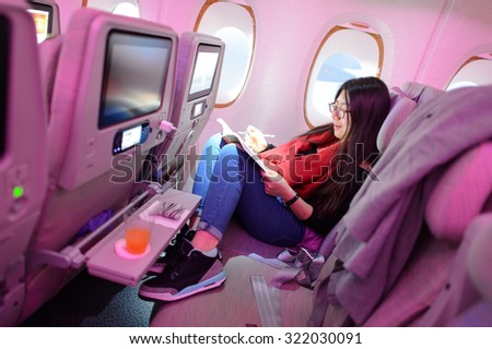 HONG KONG - MARCH 09, 2015: Emirates Airbus A380 economy class passenger. Emirates handles major part of passenger traffic and aircraft movements at the airport.